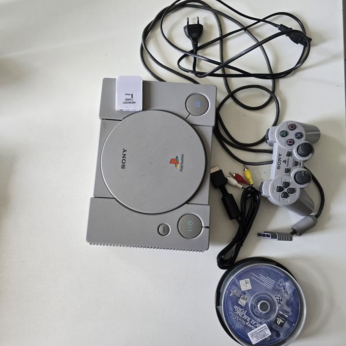 Consola Playstation 1 modata cu 10 jocuri si controller original
