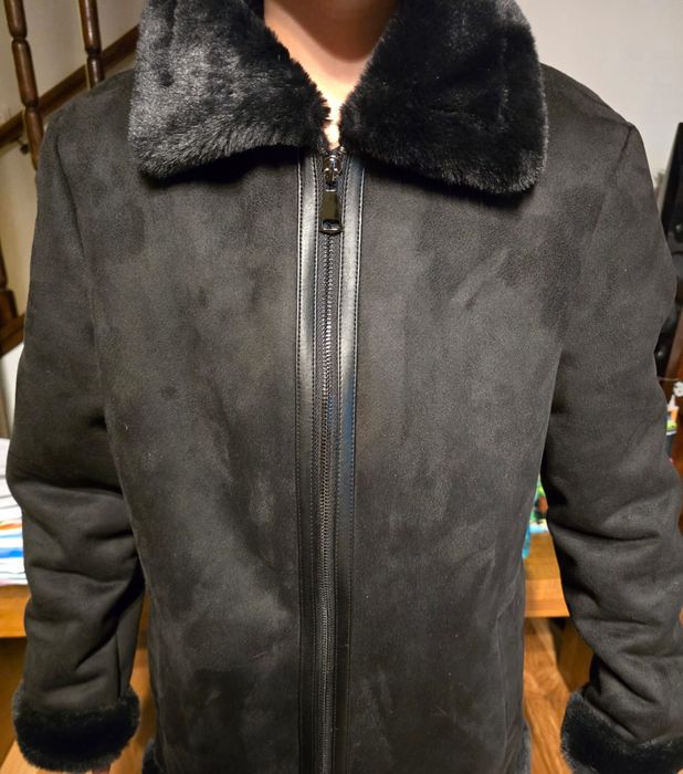 Haină din blană ecologică nouă.