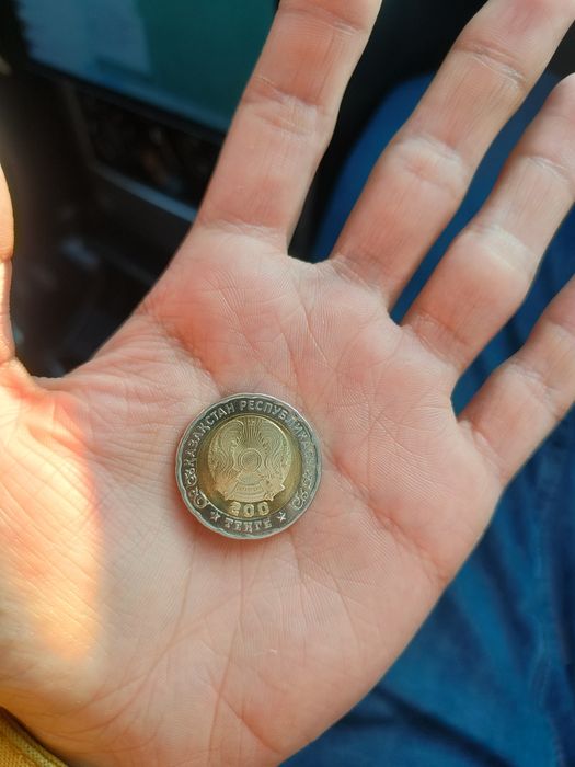 80 жылдык монета тиын