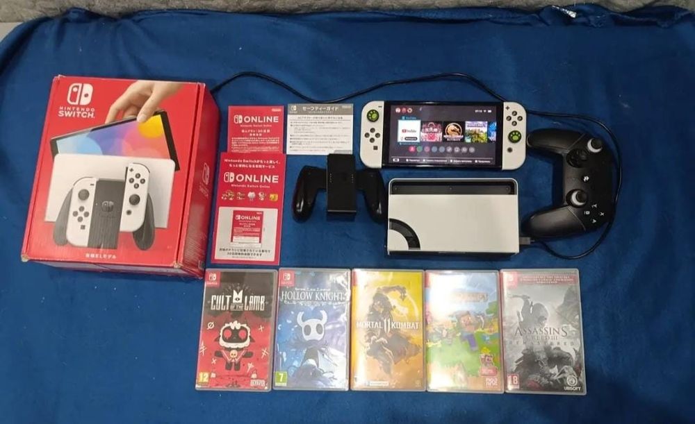 Продам игру Nintendo Switch OLED + дополнительные джостик + 5 игр