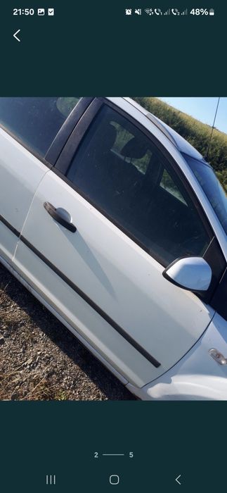 Vand usi complecte albe  fata spate dreapta ford focus 2 an 2007