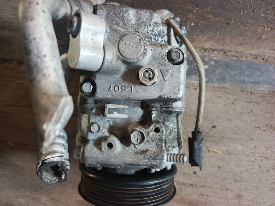 Компрессор кондиционера бмв