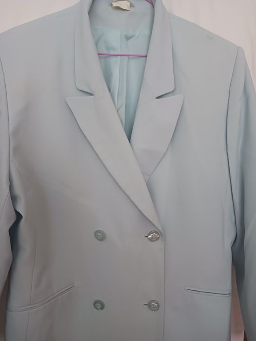 Дамско сако.Светло синьо.Голям размер.