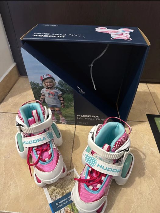 Patine cu rotile mărimi reglabile 26-29 - Roz, stare foarte buna.