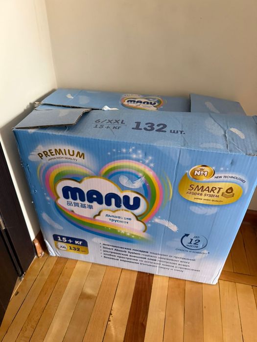 Продам две запечатанные упаковки подгузников Manu XXL