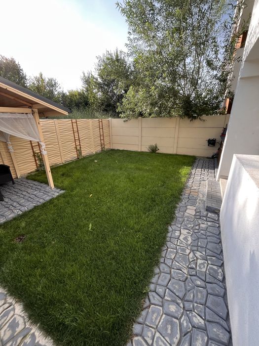 Apartament cu gradina proprie