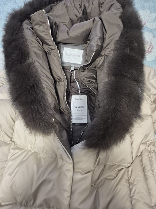 Продам пуховик зимний новый