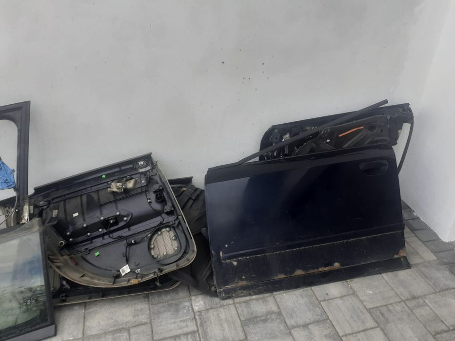 Vind portiere sau diferite piese faruri sau sticla portiere  audi a4