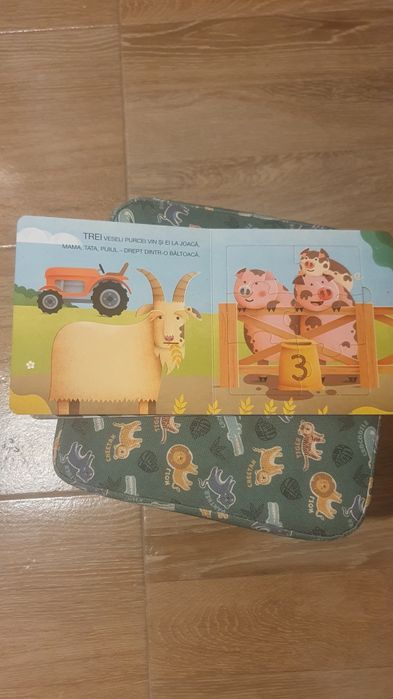 Carte bebelusi cartonata cu 5 puzzle-uri integrate