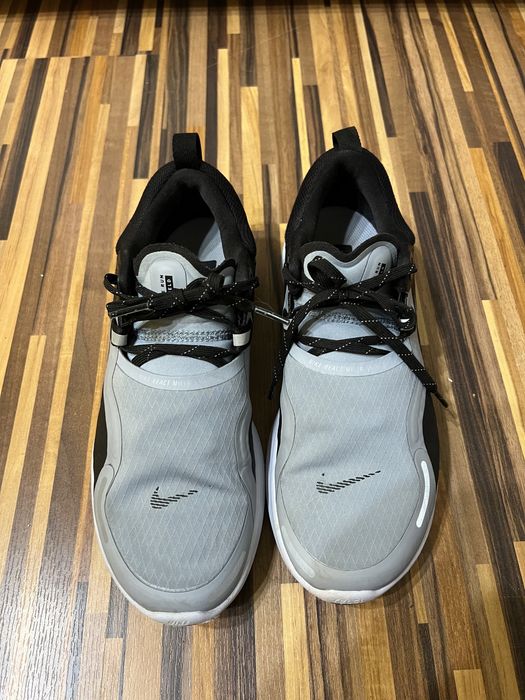 Nike react miler shield obsidian mist-pink blast