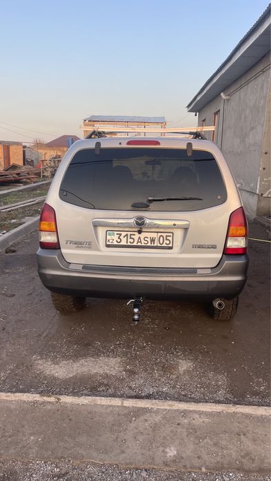 Мазда трибьют 3 литра