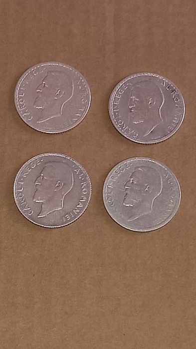 Vand 4 monede vechi de argint de cate 1 leu an 1910