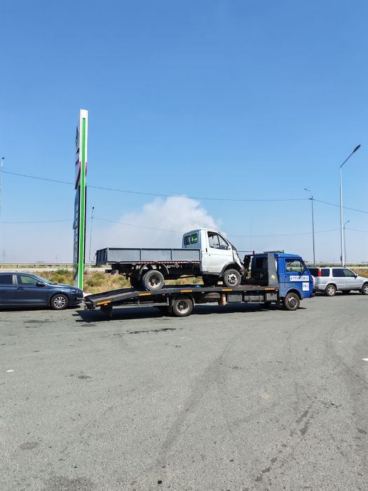 Услуги эвакуатора для спецтехники и авто