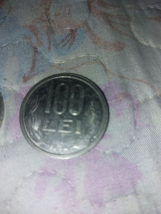 Vand monede vechi de 100 lei