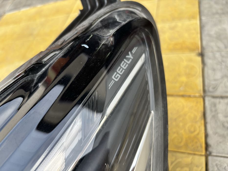 Фара Geely Emgrand