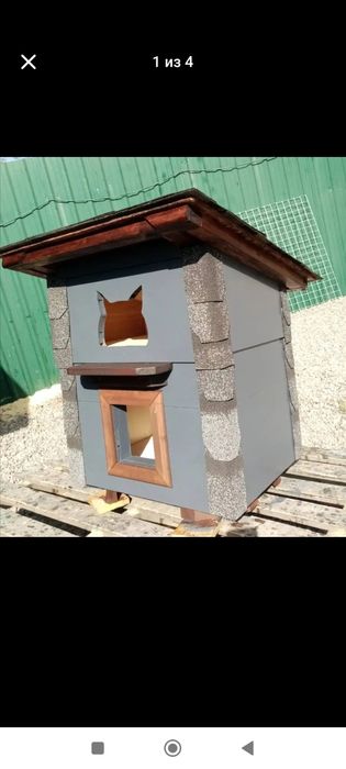 Маленький уютный домик для кошки.