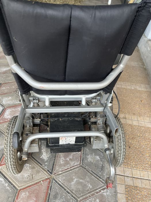 Электрическая инвалидная коляска