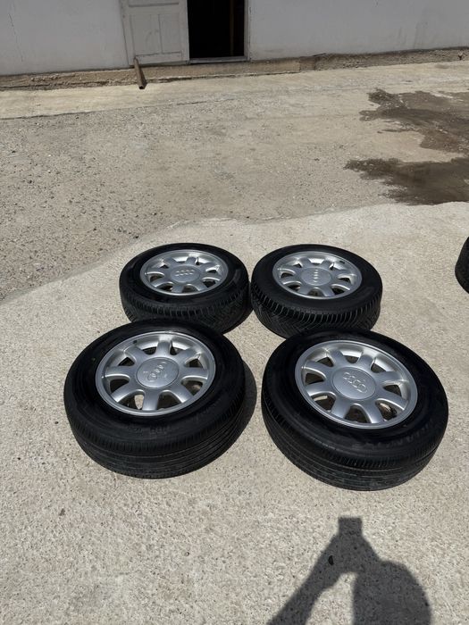 Ауди А6 с4 ромашка r15