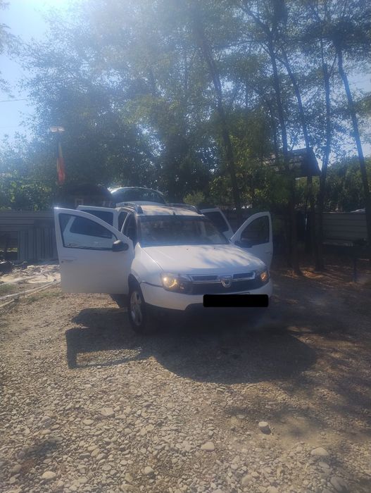 Vand Dacia Duster 2013 sau schimb