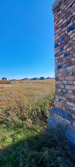 Продам недостроенный дом в Бозайгыре 25 соток участок