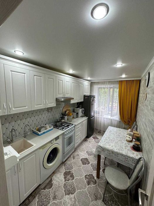 Продам 4 комнатную квартиру