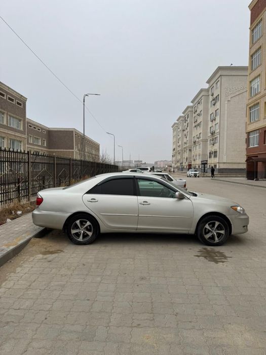 Машина Камри 35