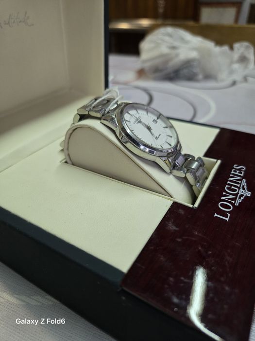 Longines quartz нов