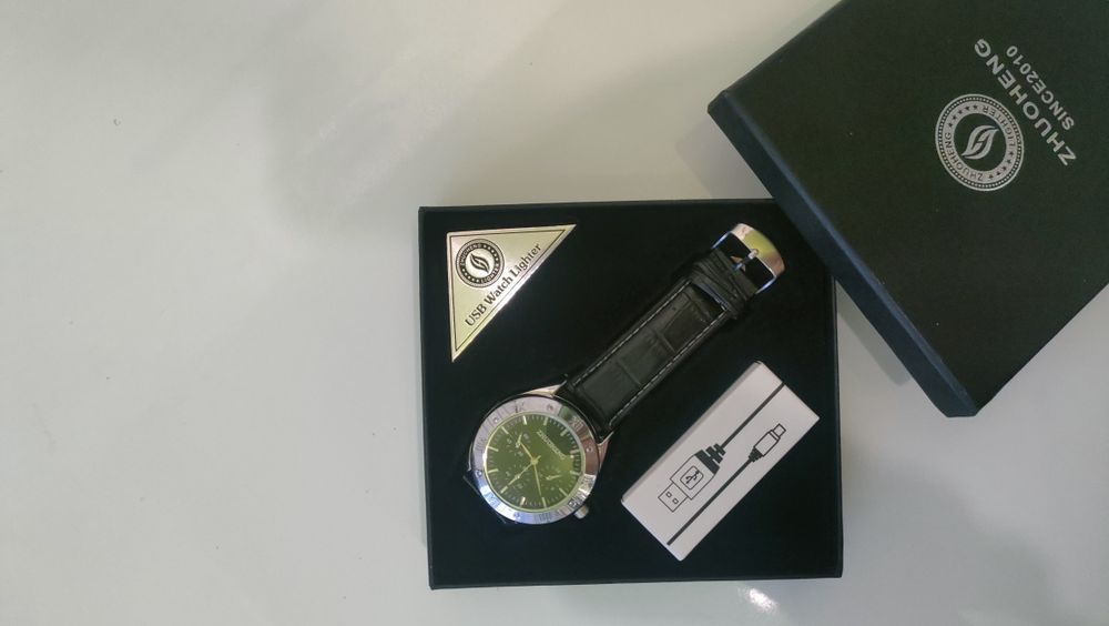 Часы зажигалка продам