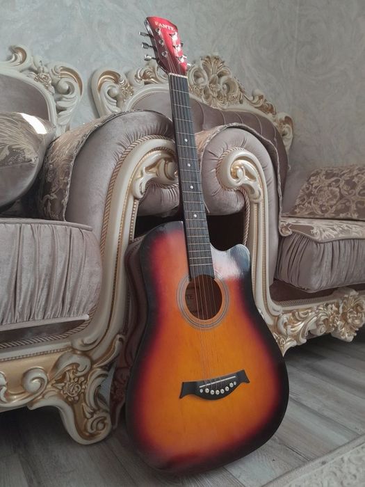 Gitara yangi Rossiyadan kelgan 
Gitara yangi Rossiyadan kelgan