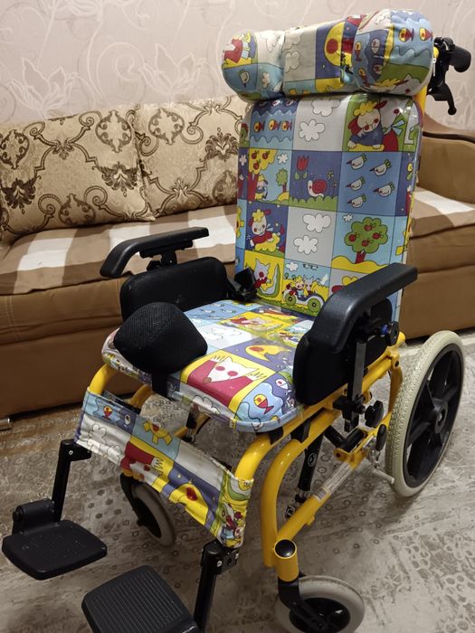 Детская инвалидная коляска