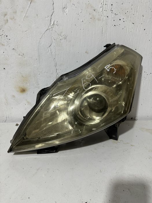 Левый фара Nissan Presage