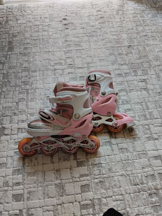 Роликовые коньньки