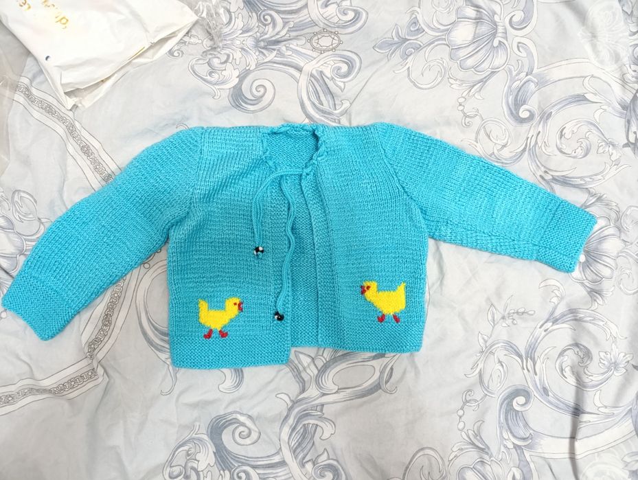 Теплые одежды для малышей