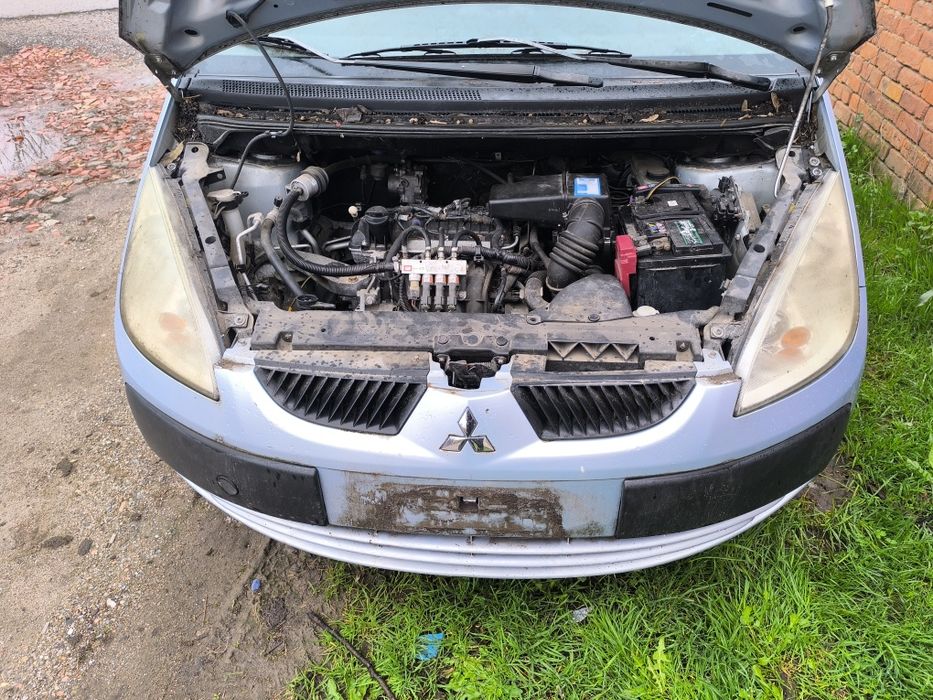 На части Mitsubishi Colt