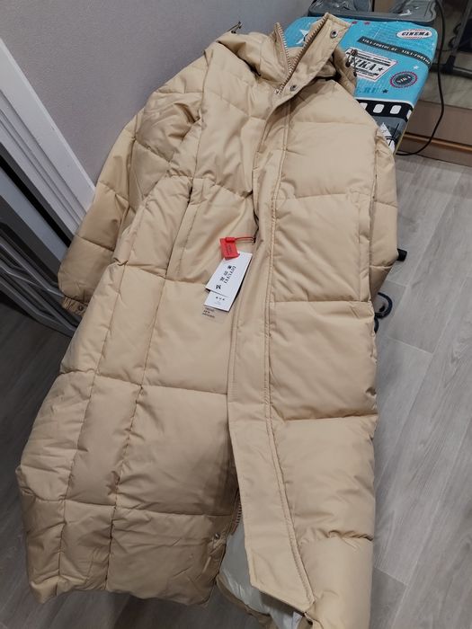 Продам пуховик длинный