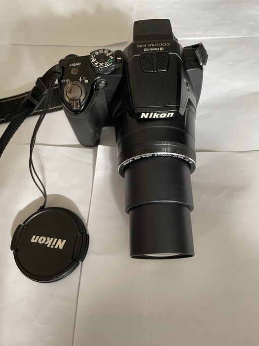 Nikon P100 26x zoom optic,10,3 Mpx,ecran rabatabil, afisare data ora