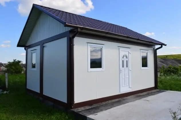 Vând casă pe structură metalică învelită cu panouri sandwich