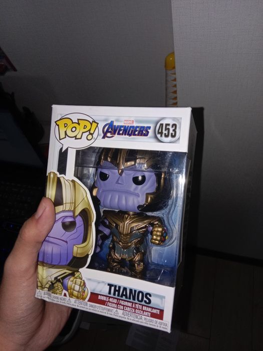 Танос из фильма Мстители Финал