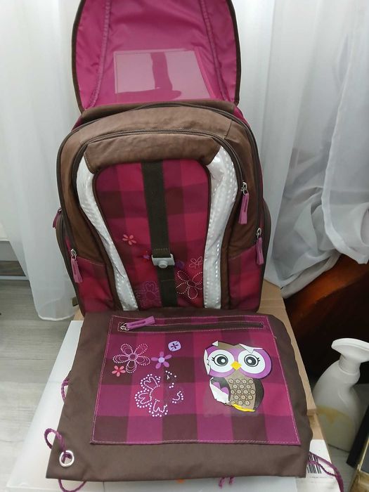 Ghiozan ergonomic scheider cu saculet de sport  in stare foarte buna .