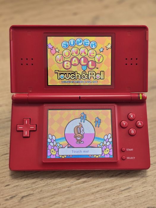 Nintendo DS Lite + încărcător + joc