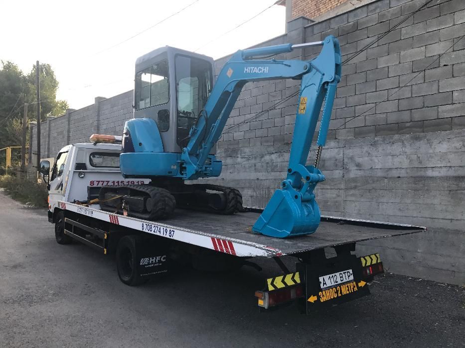 Услуги мини экскаватор .. экскаватор .. трактор ..HITACHI EX30UR-2