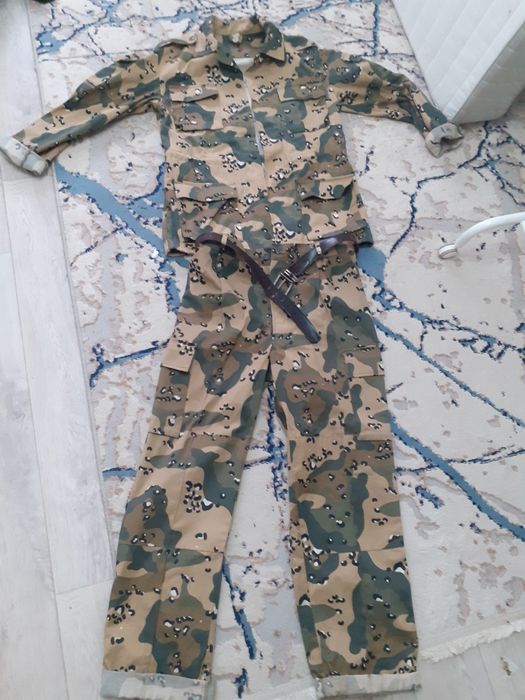 Камуфляж костюм новый.