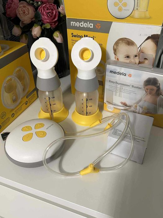 Комплект Medela помпа, чаши, фунии и бюстие