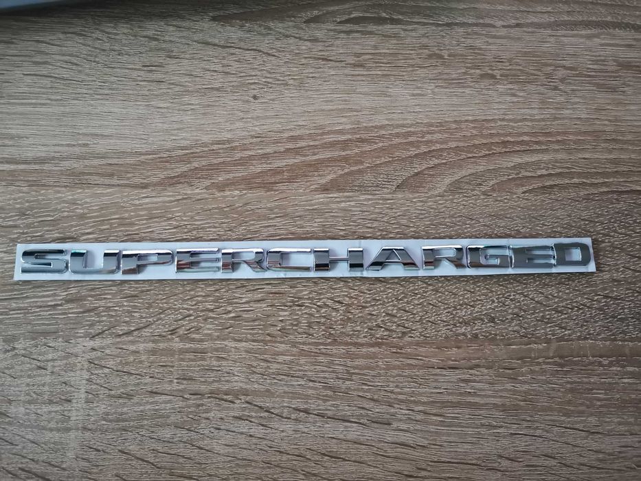 Supercharged емблема лого надпис
