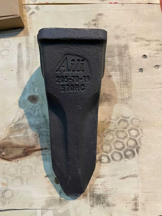 Зубья,адаптеры,фиксаторы,коронки