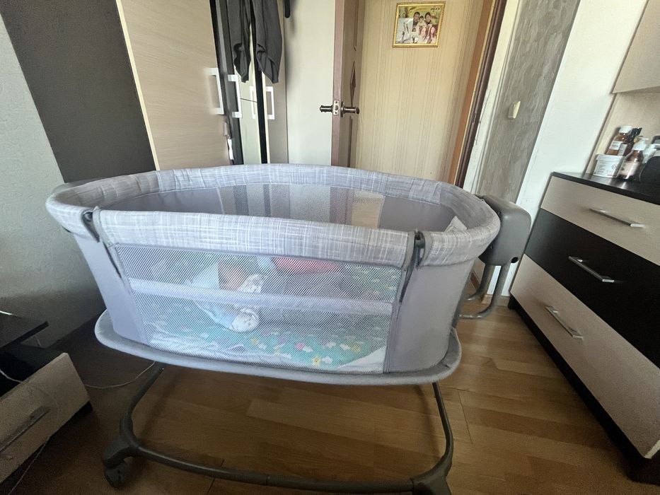 Продам электрическую кроватку качалку