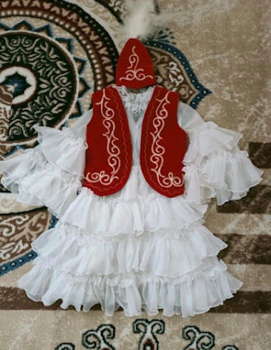 Прокатка кыз балаға қазақша көйлек бар