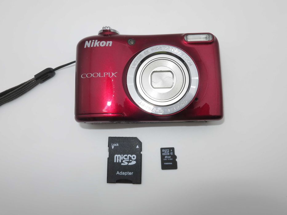 Nikon Coolpix L29 ултра компактен цифров фотоапарат, дигитална камера в лачено червен цвят, отлично състояние, работи перфектно!