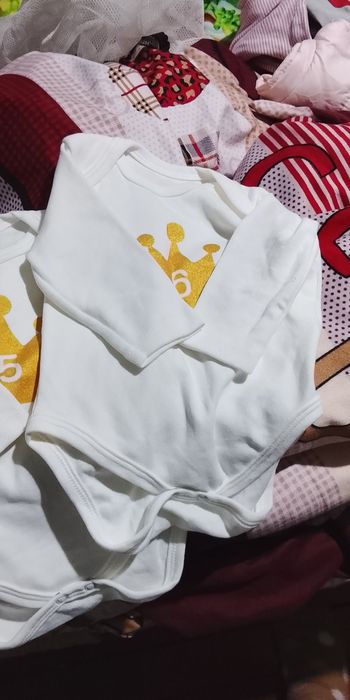 Отдам новорожденные вещи обувь погремушки