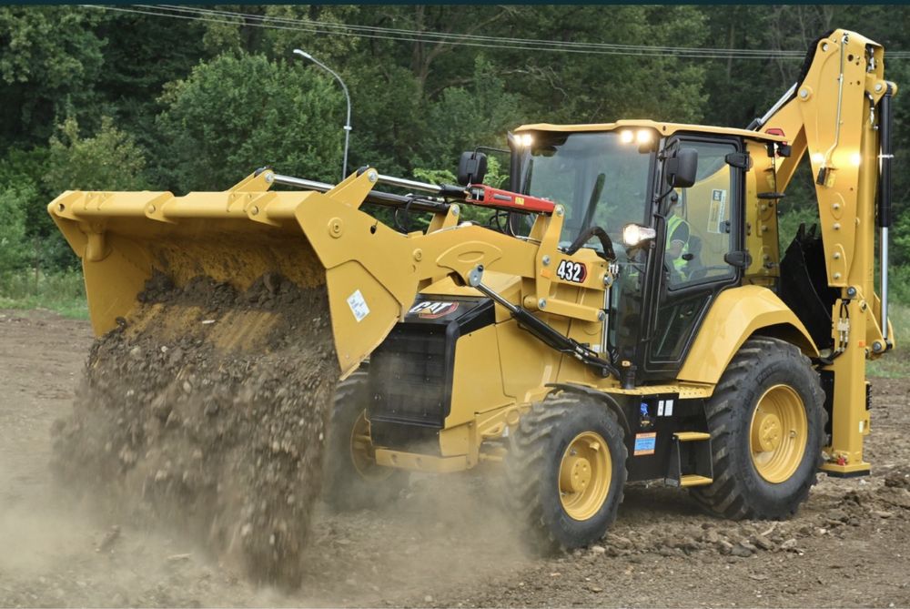 Excavator pe pneuri/ buldoexcavator/ buldozer/ bascula 8x4